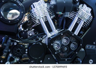 background of motorcycle engine part close-up. V-shaped motorcycle engine. powerful motorcycle engine
