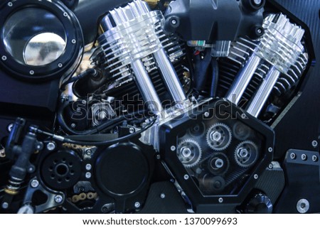 background of motorcycle engine part close-up. V-shaped motorcycle engine. powerful motorcycle engine