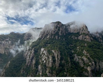 background with a mountain and clouds on it