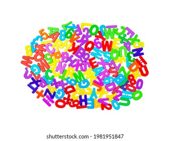 Background from multi colored plastic letters and numbers in a chaotic manner on a white backdrop. English alphabet. Children school developmental constructor. Notebook. View from above. Flat lay