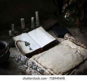 Background With An Old Book And Paper On The Table With Candles