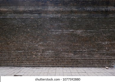 Background of old brick wall - Shutterstock ID 1077592880
