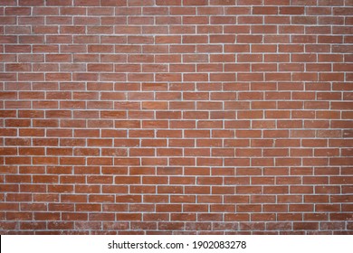 Background of old and rustic red brick wall - Shutterstock ID 1902083278