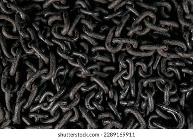 Background of old rusty chains. Close-up.