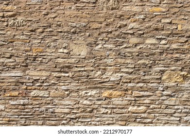 Background Of Old Sandstone Brick Wall Texture