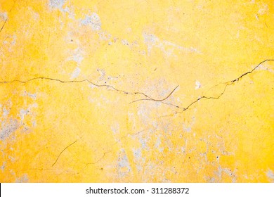 Background Of Old Yellow Painted Wall