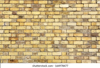 Background on an old yellow brick wall