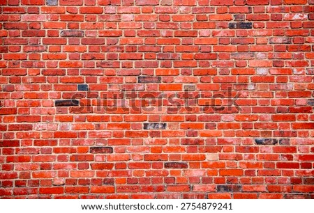 Background on wall texture. Bricks in redbrick masonry. Wall on surface pattern. Background for rustic facade.