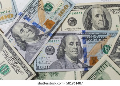 Background of one hundred dollar bills