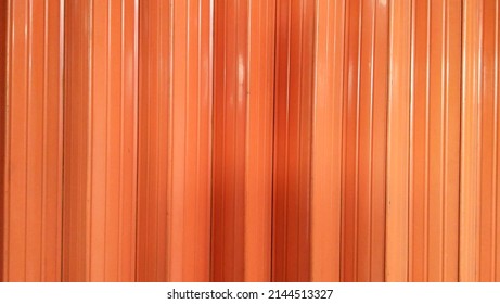 background of orange iron gate close up