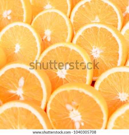 Background of oranges cut in half