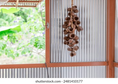 The background of the park decoration has a corner and wooden chairs for sitting and relaxing during the day. Amidst a grove of flowers