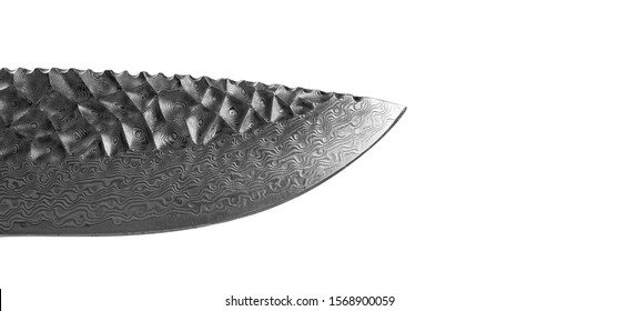 Background with pattern of damask steel blade. Close up. Macro shot of a damascus steel knife blade texture. Damascus steel blade pattern isolated on white. Damascus steel with original pattern
