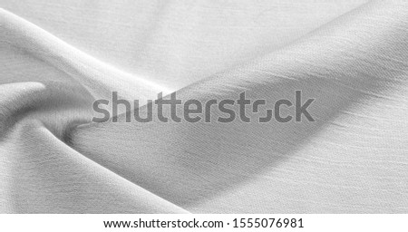 Background, pattern, texture, wallpaper, white silk fabric. It has a smooth matte finish. Use this luxurious fabric for anything - from design to your projects. The possibilities are truly endless!
