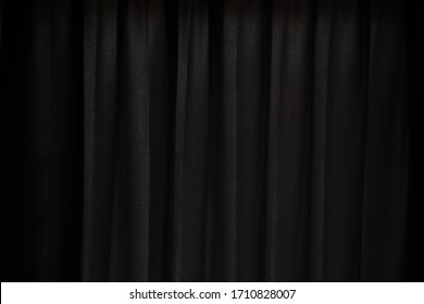 The background photo of dark grey color beautiful curtain in the dark modern design bed room