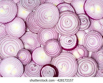 Background Photo Of Sliced Red Onions.
