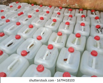 background photo of a white jerry can filled with water view from top