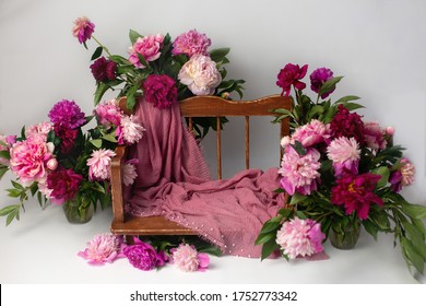 background of the photo zone for shooting. props for photo shoots. wooden bench in peonies