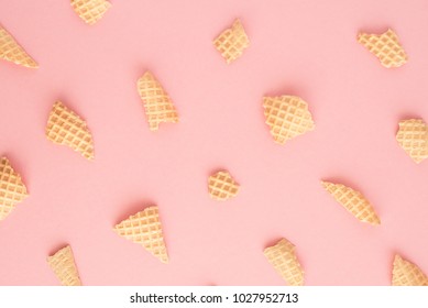 Background From Pieces Of Waffle Cone On Pink Background