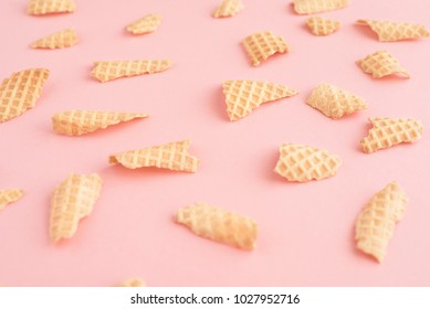 Background From Pieces Of Waffle Cone On Pink Background