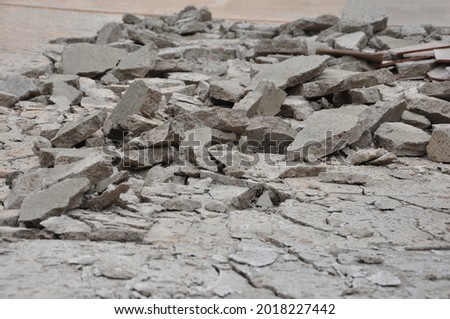 background a pile of broken concrete, selective focus