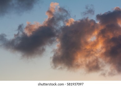 background of pink and blue clouds in the tropical sky at dawn