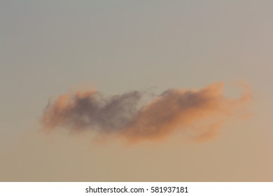 background of pink and blue clouds in the tropical sky at dawn