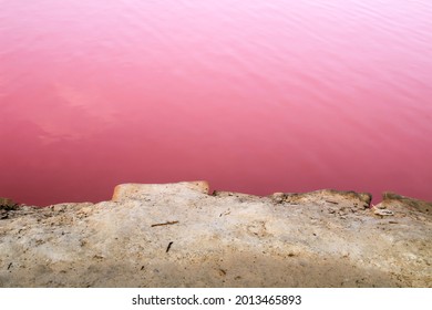 Background Of A Pink Salt Flat Of The Saltworks In San Pedro Del Pinatar, Murcia Province, Spain