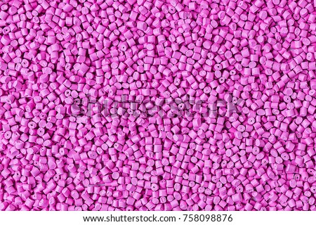 Background of plastic granules. Polymeric pellets. Colorant for plastics. 