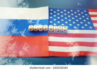 The Background Is Political. American And Russian Flag On Background. US Sanctions Against Russia. Exacerbation Of Dipomotic Relationships.