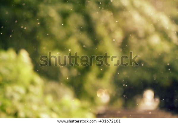 Background.\
Raindrops and silhouettes in the\
rain.