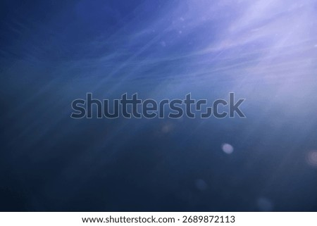 background rays of light under water, abstract pond in sunlight, nature backdrop underwater photography