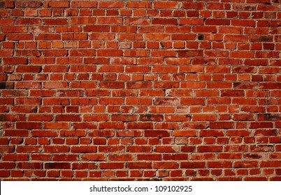 Background of red brick wall pattern texture. Great for graffiti inscriptions.