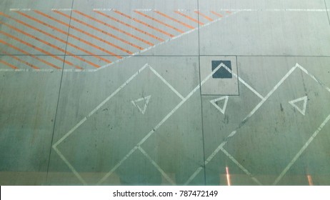 Background Of Red Line And Square Line (parking Lot) And Triangle Arrow On The Ground At Airport Runway. View From Top