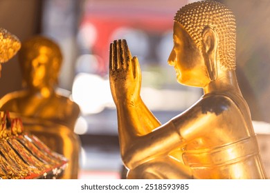 Background of the religious tourist attraction Wat Phra Sri Rattana Mahathat Worahawihan There is a pair of Buddha statues in Phitsanulok. Tourists often come to pay respect. - Powered by Shutterstock