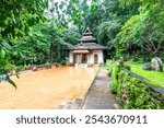 Background of religious tourist attractions on the high mountain on the way up to Doi Suthep, Chiang Mai, Thailand. An ancient temple with beautiful sculptures, Wat Pha Lat, is always popular.