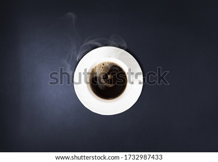 Background for restaurant or coffee shop for Ramadan & Eid celebration where cup of coffee or tea in half moon represents for eid. 