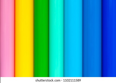 Background of rolls of colored vinyl film