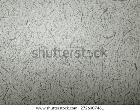 background of rough-textured abstracts in white and a mixture of scintillating black