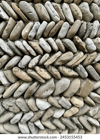 Background with roundshape stones wall