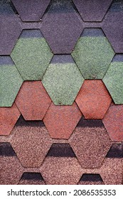 Background, samples, multi-colored flexible, soft tiles to cover the roof of the house. Construction material