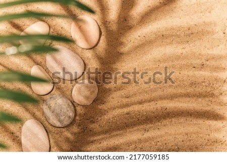 background with sand for cosmetic product presentation. Podium for the demonstration of cosmetic products.
