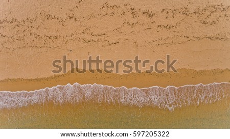 Similar – Foto Bild Luftbild Panoramadrohne Blick auf blaue Meereswellen und schönen Sandstrand in Portugal