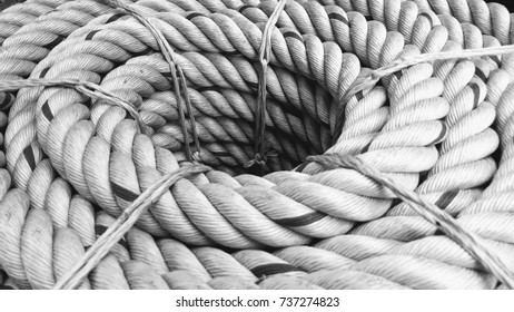 background of ship rope selective focus at the hole - black and white