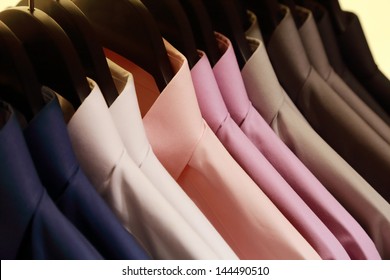 Background Of Shirts Hanging On A Hanger