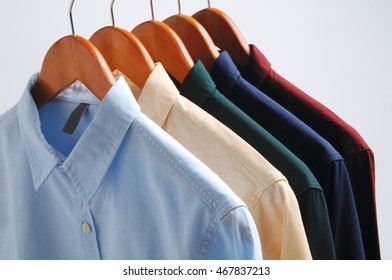 Background Of Shirts Hanging On A Hanger