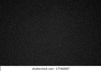 Background shot of black plastic texture