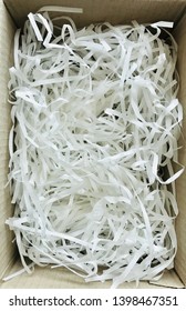 Background Of Shredded Paper In The Box For Protection.