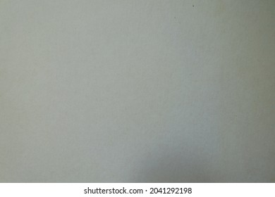 Background - simple cream white paperboard from above