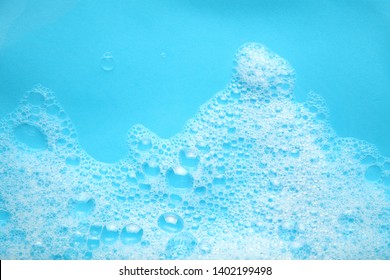 Background Soap Suds (foam) And Bubbles From Detergent. House Cleaning Concept.